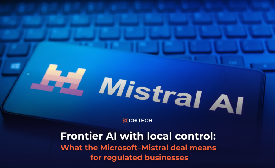 Mistral AI logo on a smartphone screen resting on a keyboard, illustrating the Microsoft–Mistral partnership for CG TECH's article on frontier AI and data control for regulated businesses.
